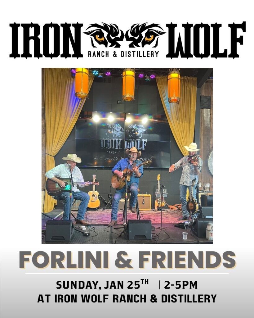 Three musicians in cowboy hats perform with guitars on a stage at Iron Wolf Ranch & Distillery. The backdrop displays the Iron Wolf logo. Text reads: Forlini & Friends, Sunday, Jan 25th, 2–5pm at Iron Wolf Ranch & Distillery.