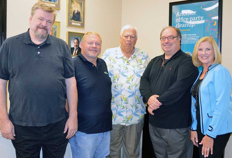 Hill Country Community Theatre Executive Director Mike Rademaekers (left) and theater board President Linda DiFede (right) thank the Martin Foundation, represented by Larson Lloyd, Charlie Keiser, Frank Reilly, and Robert Klaeger (not pictured), for the foundation’s generous donation of $10,000. Courtesy photo