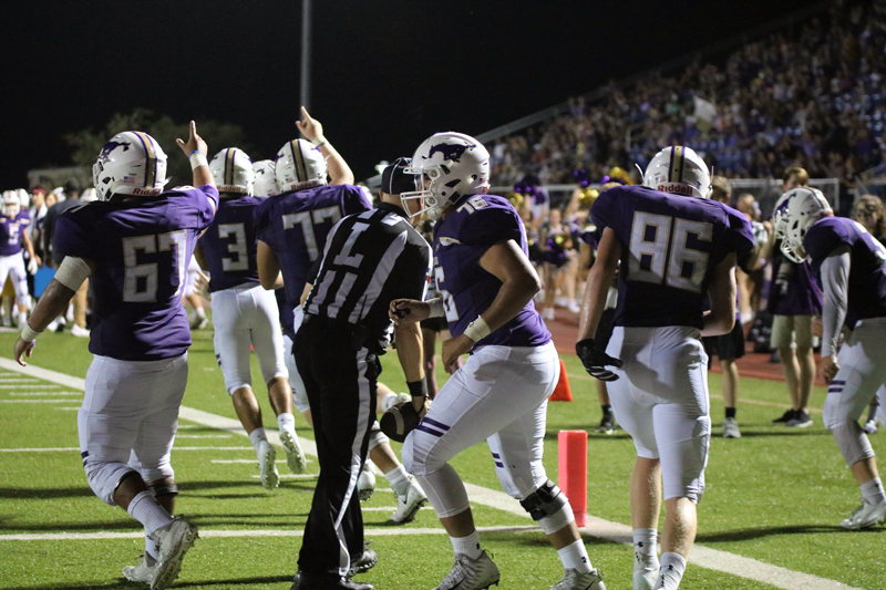 While Mustang Stadium is typically associated with Marble Falls High School football, the facility actually serves many teams, programs, and events, including the band and commencement ceremonies. After eight years of use, the stadium’s turf and track are showing wear and tear. Marble Falls Independent School District is taking a $55 million bond proposal to voters on Nov. 6 that includes $900,000 for turf and track upgrades. Photo by Martelle Luedecke/Luedecke Photography