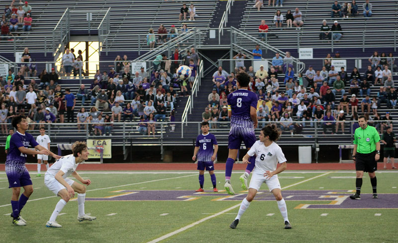Marble Falls High School’s Josiah Rojas leaps high for a header to a teammate during the 2-1 regional quarterfinal loss to Cedar Park High School. Staff photo by Jennifer Fierro